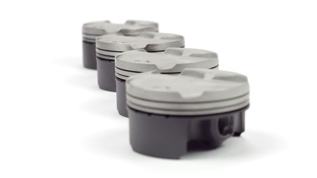 Graphite coating scooter pistons